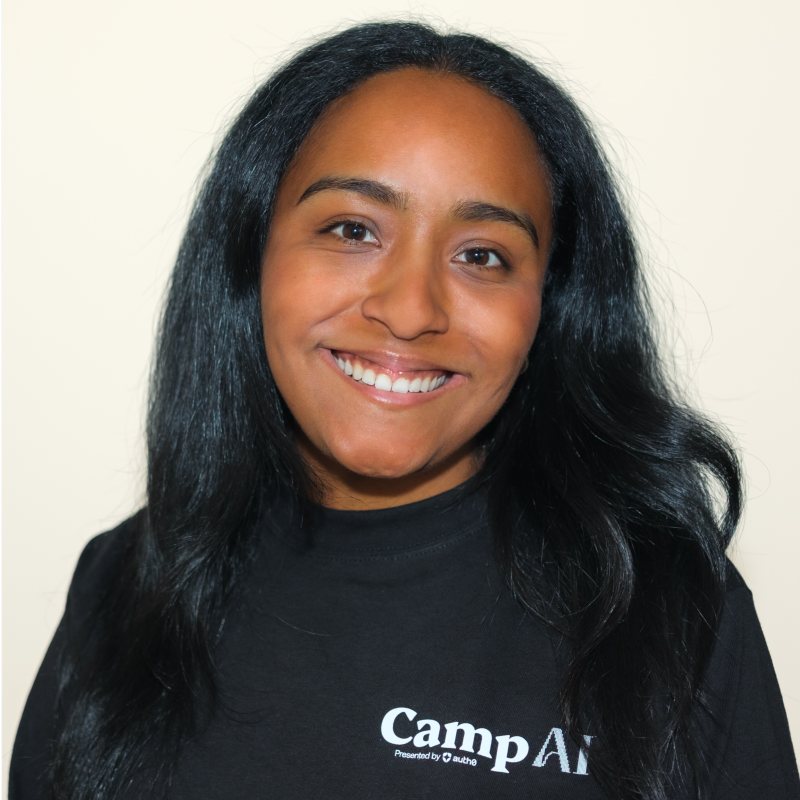 Calah Vargas smiling in a Camp AI shirt